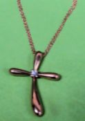 18ct (750) yellow gold cross set with central brilliant cut diamond, on 18ct link necklace