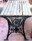 Victorian cast iron slatted garden table. Approx. 65 x 122 x 65cms