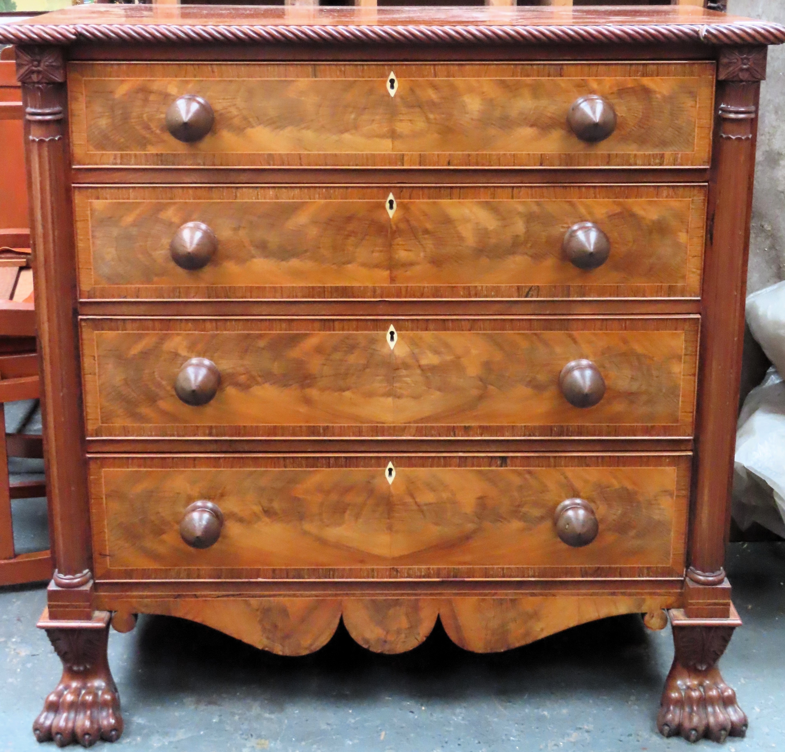 19th century inlaid mahogany piecrust edged chest of four drawers