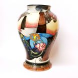 A 2007 Moorcroft tube lined vase decorated with chimneys resembling the Moorcroft heritage