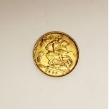 A 1908 gold half sovereign.