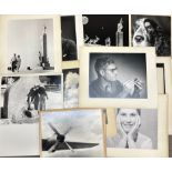 An extensive collection of large unframed professional quality mid 20th century photographs