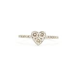 An 18ct white gold heart shaped ring set with brilliant cut diamonds and diamond set shoulders, (