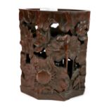 A Chinese carved wooden octagonal bamboo brush pot decorated with flowers and a crab, H. 16cm, D.
