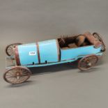A large hand made copper and iron model of an early racing car, L. 69cm, H. 23cm.