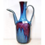A Chinese porcelain zhun glazed pottery wine jug. H 33cm.