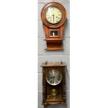 Two wall clocks, tallest H. 57cm.
