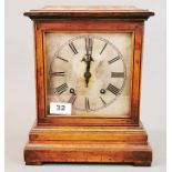 A cased Walter Munn & Co key wind mantel clock (back left foot missing.) H. 11cm.