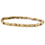 A 9ct yellow gold bracelet set with brilliant cut diamonds, approx 2.8ct. L. 19.5cm.