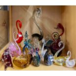 A quantity of Murano and other glass paperweights and figures, tallest H. 30cm.