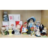 A group of fourteeen porcelain Wade figures, including a figure of Betty Boop H. 21cm.