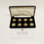 A boxed set of eight 24ct gold plated US Presidents dollar collection.
