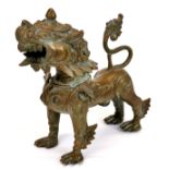 A 19th century Oriental bronze / brass liondog censer, L. 10cm, H. 13.5cm