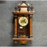 A 19th century mahogany and pine wall clock with Art Nouveau stained decoration, H. 61cm.