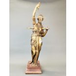 A large cast bronze figure of Justice on a wooden base, H. 74cm.