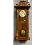 A mahogany wall clock, H. 115cm.