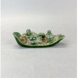 A Chinese carved jade / hardstone figure of the happy Buddha in a boat with 'cash', L. 19cm.