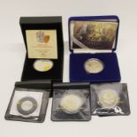 A 2005 silver proof Battle of Trafalgar commemorative crown, together with a WWI commemorative
