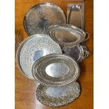 A group of silver plated trays.