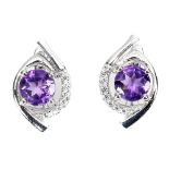 A pair of 925 silver earrings set with rund cut amethysts and white stones, L. 1.6cm.