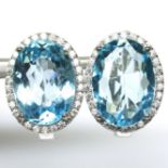 A pair of 925 silver earrings set with large oval cut Swiss blue topaz, L. 1.5cm.