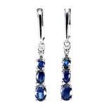 A pair of 925 silver drop earrings set with oval cut sapphires, L. 3.2cm.