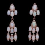 A pair of rose gold on 925 silver drop earrings set with cabochon cut opals, L. 3.8cm.