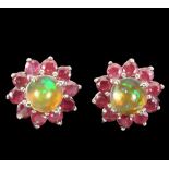 A pair of 925 silver earrings set with opals and rubies, Dia. 1.2cm.