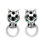 A pair of 925 silver panther shaped enamelled earrings set with green stone eyes, L. 3cm.