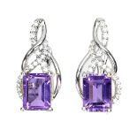 A pair of 925 silver earrings set with baguette cut amethysts and white stones, L. 2.1cm.