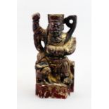 A 19th C Chinese carved, painted and gilt wooden figure with carrying handle for ceremonies, H.