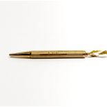 A hallmarked 9ct gold ladies propelling pencil.