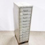 A vintage twelve drawer Triump metal filing cabinet, 105 x 31 x 42cm.