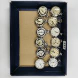 A group of twelve vintage pocket watches.