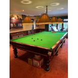 A superb Edwarding mahogany snooker table in excellent condition with a hand made reproduction brass