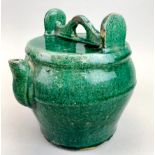 A Chinese green glazed Ming Dynasty style pottery kettle, H. 22cm (possibly of the period).
