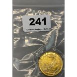 A 2015 Britannia 1oz fine gold coin ingot.