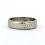 A hallmarked platinum (worn hallmark) ring, (M.5).