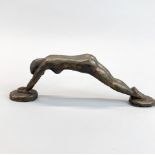 An unusual bronze sculpture of a female figure, L. 28cm.