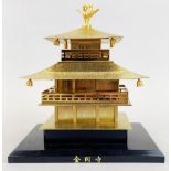 A Chinese gilt brass model of a pagoda, H. 21cm.