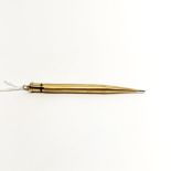 A hallmarked 9ct gold propelling pencil.