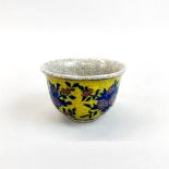 A Chinese hand painted crackle glazed porcelain tea bowl, Dia. 9cm.