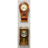 Two wall clocks, tallest H. 57cm.