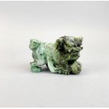 A finely carved Chinese jade figure of a lion dog, L. 9.5cm. H. 7cm.