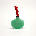 A lovely Chinese carved jade snuff bottle with gilt and branch coral stopper, bottle H. 5.2cm, total