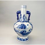 A mid 20th C Chinese hand painted porcelain vase, with elephant head handles, H. 42cm.