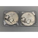 Two Chinese 1oz fine silver panda and Temple of Heaven coins.