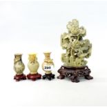 A group of Chinese carved hardstone desk items, tallest H. 23cm.
