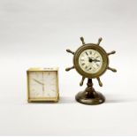 A 1970's Bucherer brushed brass mantel clock, together with a ships wheel style alarm clock, tallest