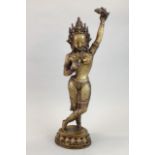 A 19th C Indian bronze figure of a temple dancer, H. 45cm.